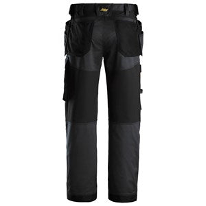 "Comfortable loose fit work trousers with tool holders and cargo pocket"