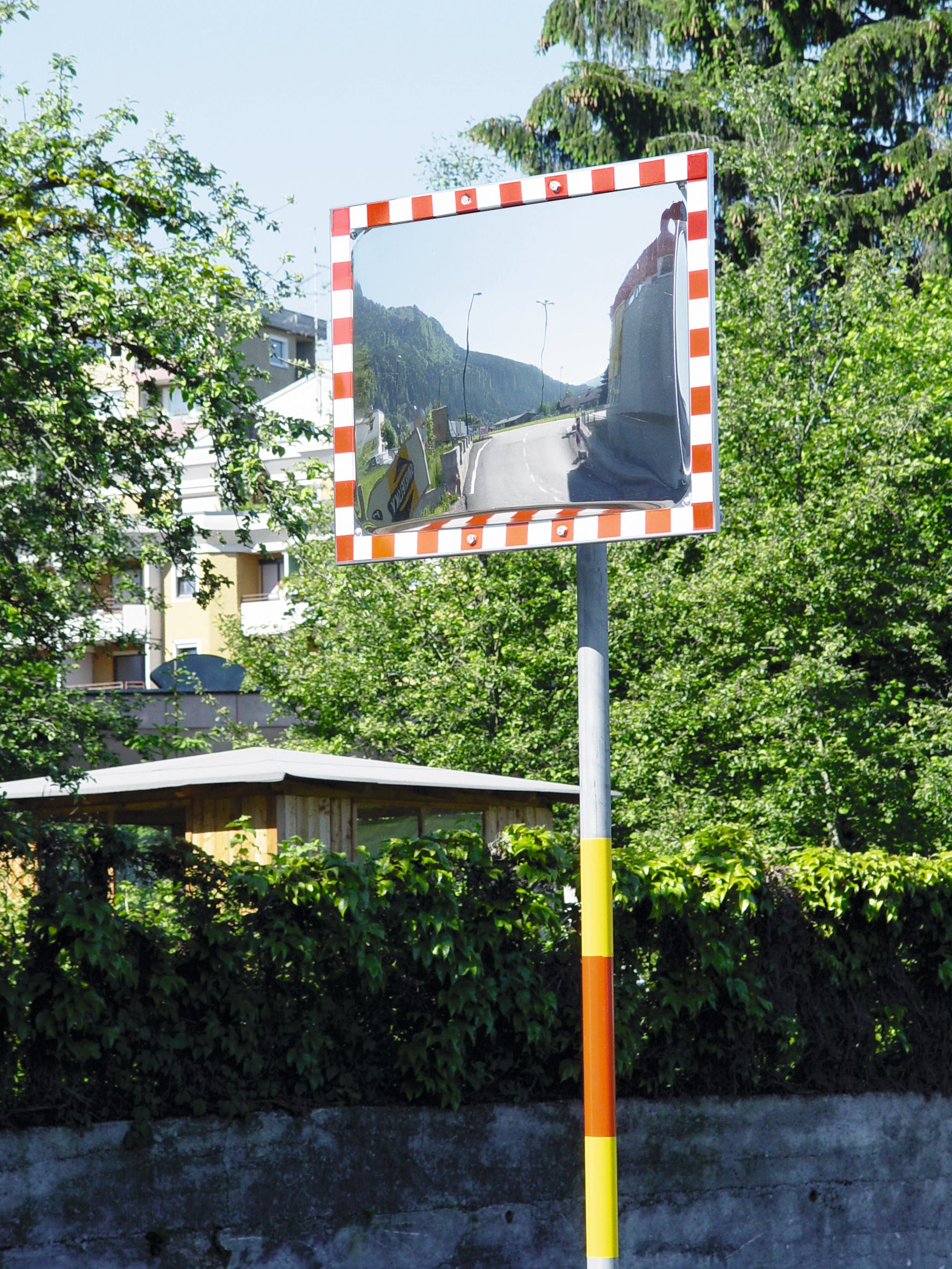 Mirror mounted to pole in mountainous area