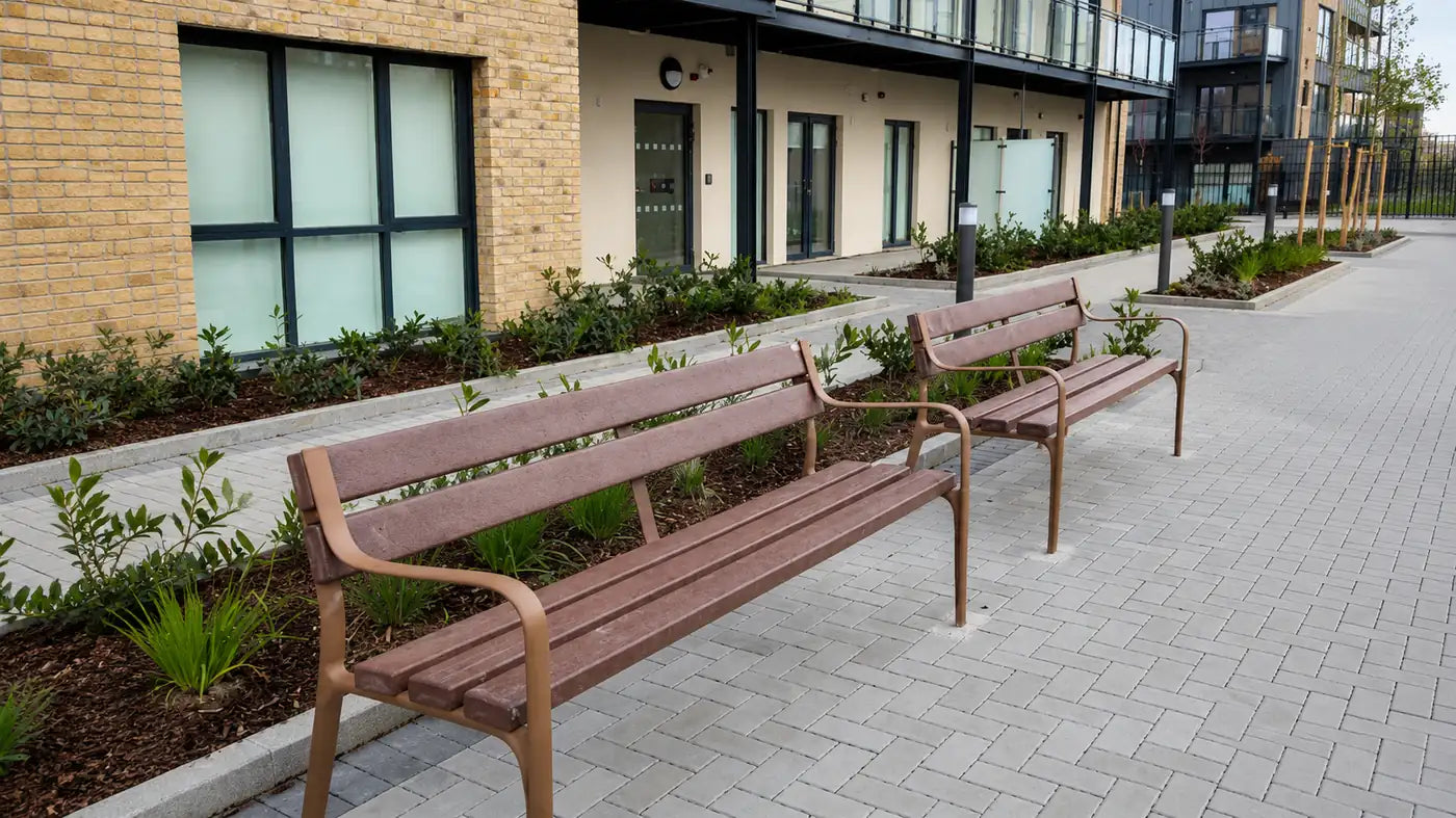 Street furniture benches installed in a landscaped public space