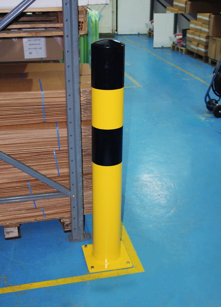 Heavy duty surface mount bollard in warehouse