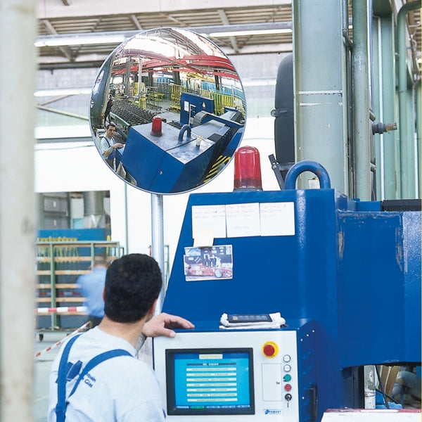 Safety mirror showing background at machinery