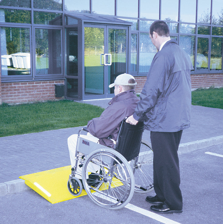 GRP Kerb Ramp In Use With Wheelchair