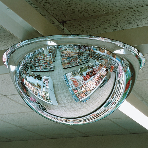 Dome mirror mounted to ceiling in shop